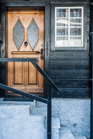 Door and Window on Black Wooden Wall