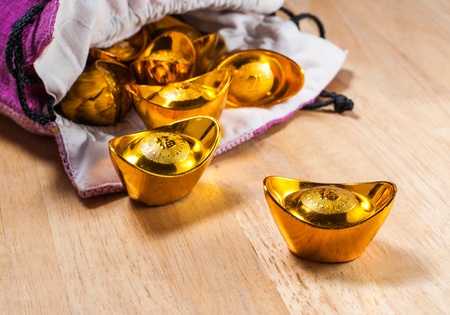 Old Chinese money in goldの写真素材