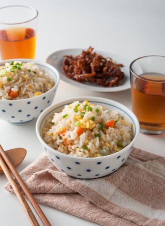 Fried Rice Chinese Style in Cup with roast pork and teaの写真素材