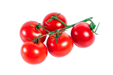 bunch of red tomatoes isolated on a white の写真素材