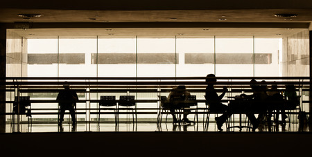 People in a work place doing various actionの写真素材