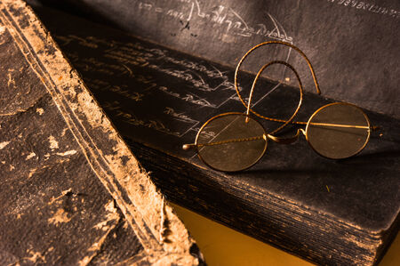 Ancient Treatise with very old glasses retro styleの写真素材