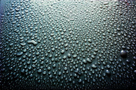 fresh background of water drops on ironic backgroundの写真素材