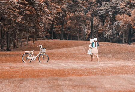 Two Girls playing in parkの写真素材