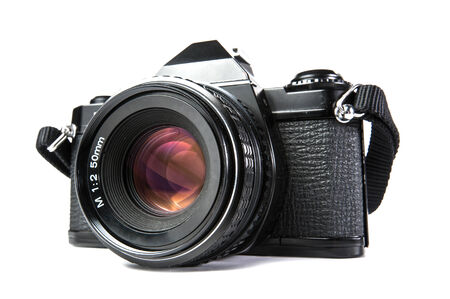 Old SLR Black Camera on White の写真素材