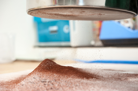 sift flour and chocolate powderの写真素材