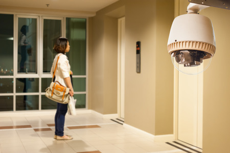 CCTV Camera or surveillance Operating in front of elevatorのeditorial素材