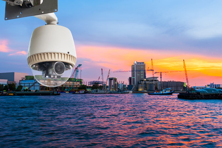 CCTV Camera or surveillance Operating with construction site at sunset