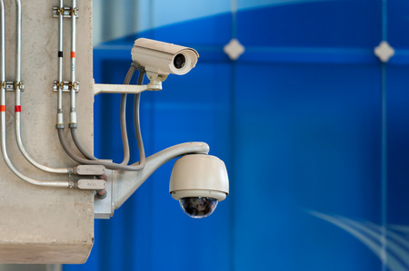 CCTV Camera or surveillance Operating on blue background