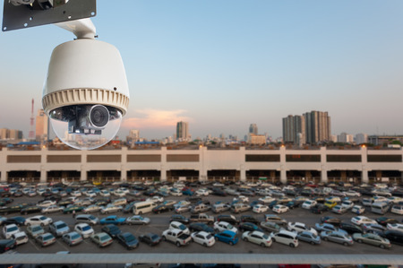 CCTV Camera or surveillance Operating over car parkの写真素材