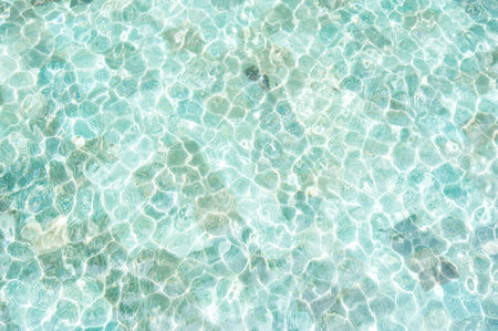 Texture of water surface in swimming poolの写真素材