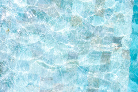 Texture of water surface in swimming poolの写真素材