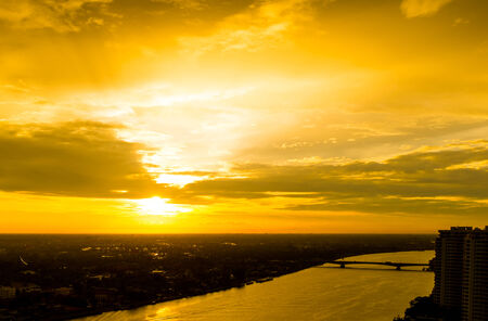 Beautiful sunset sky at golden timeの写真素材