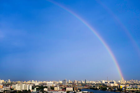 Rainbow in cityの写真素材