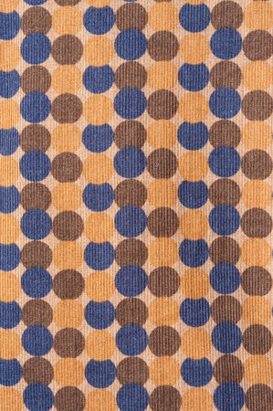 texture of blue and orange dot pattern on fabricの写真素材