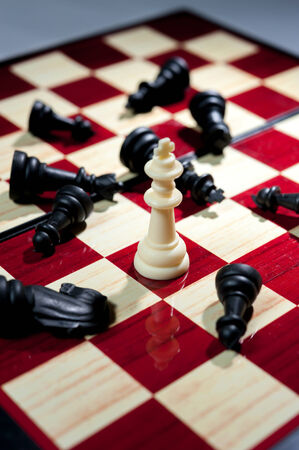 Chess board game showing the winner on white side business concept