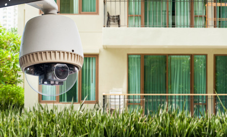 CCTV camera or surveillance operating out side corridorの写真素材