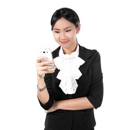 Young business woman using mobile phoneの写真素材