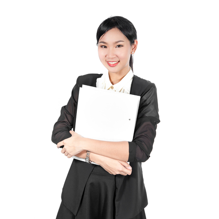 Young business woman holding white fileの写真素材