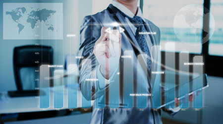 businessman working on bar chart business strategy conceptの写真素材