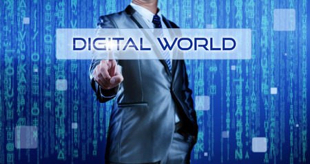 Business man with digital background pressing on button digital worldの写真素材