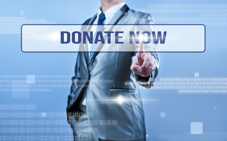 businessman making decision on donate nowの写真素材