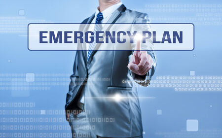 businessman making decision on emergency planの写真素材