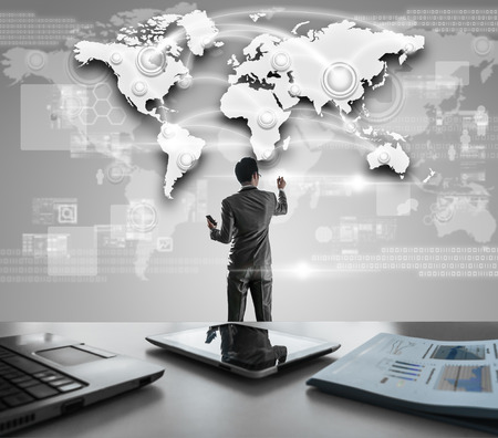 Businessman pressing on digital virtual screen, globalization marketing conceptualの写真素材