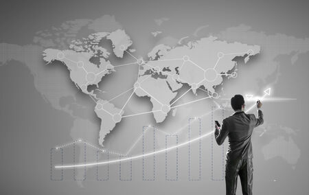 Businessman working on digital virtual screen, globalization marketing conceptualの写真素材