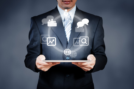 Businessman making decision on meeting work space with tabletの写真素材