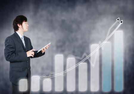 Asian businessman using tablet, business concept of vision strategyの写真素材
