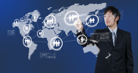 Businessman pressing on digital virtual screen, human resource management conceptの写真素材