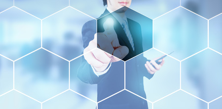 businessman pressing on digital screen, editable business contentの写真素材