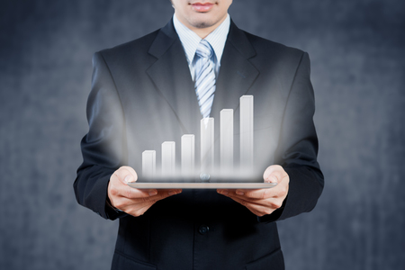Businessman using tablet with digital visual object, businessの写真素材