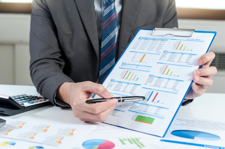 Businessman show report, business performance conceptの写真素材