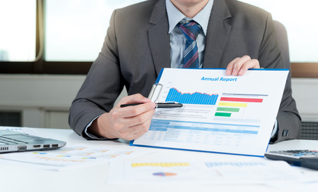 Businessman show report, business performance conceptの写真素材