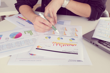 Businessman show annual report, business performance conceptの写真素材