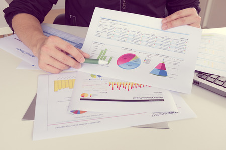 Businessman show annual report, business performance conceptの写真素材