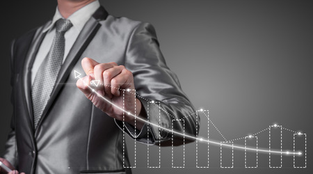 businessman working with digital chart, business improvement conceptの写真素材