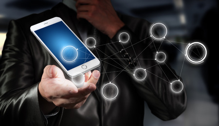 Globalization or Social network concept background with new generation of mobile phoneの写真素材