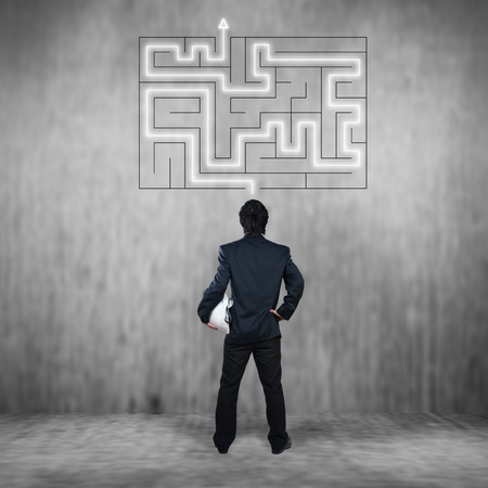 Businessman with maze, business concept of decision makingの写真素材