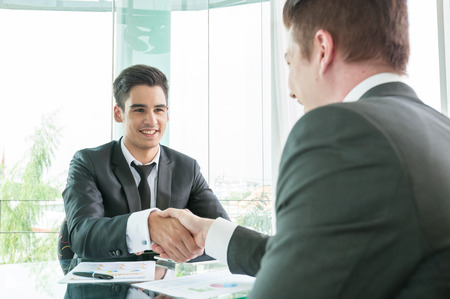 Businessman shaking hand, business situationの写真素材
