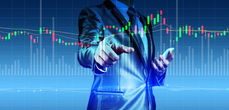 double exposure of businessman with stock market chartの写真素材