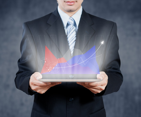 Businessman using tablet with digital visual object, businessの写真素材