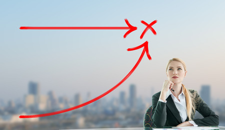 Businesswoman imagine of two red curveの写真素材