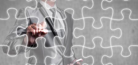 businessman draw jigsaw line, business strategy conceptの写真素材