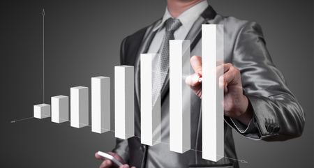 businessman working with digital chart, business improvement conceptの写真素材