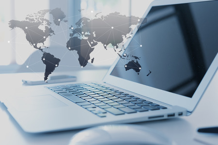 Laptop with globalization concept, technology layer effect Laptop with globalization concept, technology layer effect