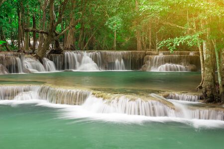 Deep forest waterfall at Huay Mae Kamin waterfall National Park Kanchanaburi Thailandの写真素材