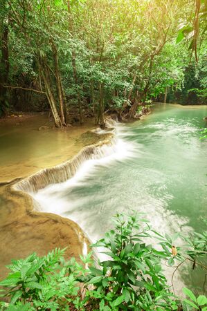 Deep forest waterfall at Huay Mae Kamin waterfall National Park Kanchanaburi Thailandの写真素材